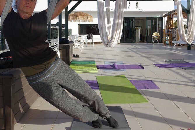 Aerial Yoga Experience in Maspalomas, Spain - Health notes: handling high blood pressure and glaucoma considerations