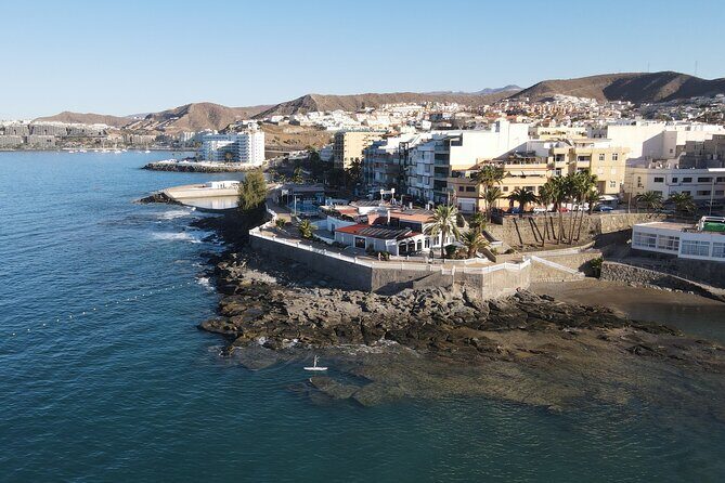 Gran Canaria: Small Group Sup Yoga Experience. - Gear that actually helps: lycra, leash, stabilizer dock, and GoPro pics