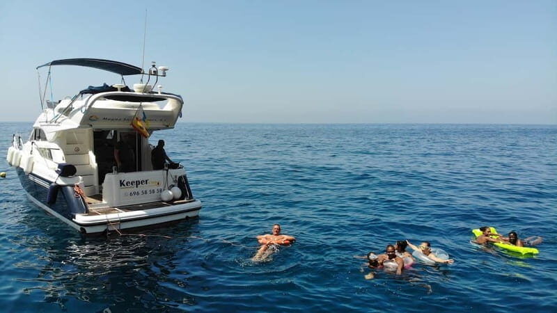 Mogan: Dolphin Watching Boat Trip with Swim Stop - Puerto de Mogan’s 4-hour dolphin hunt on the KEEPER UNO yacht